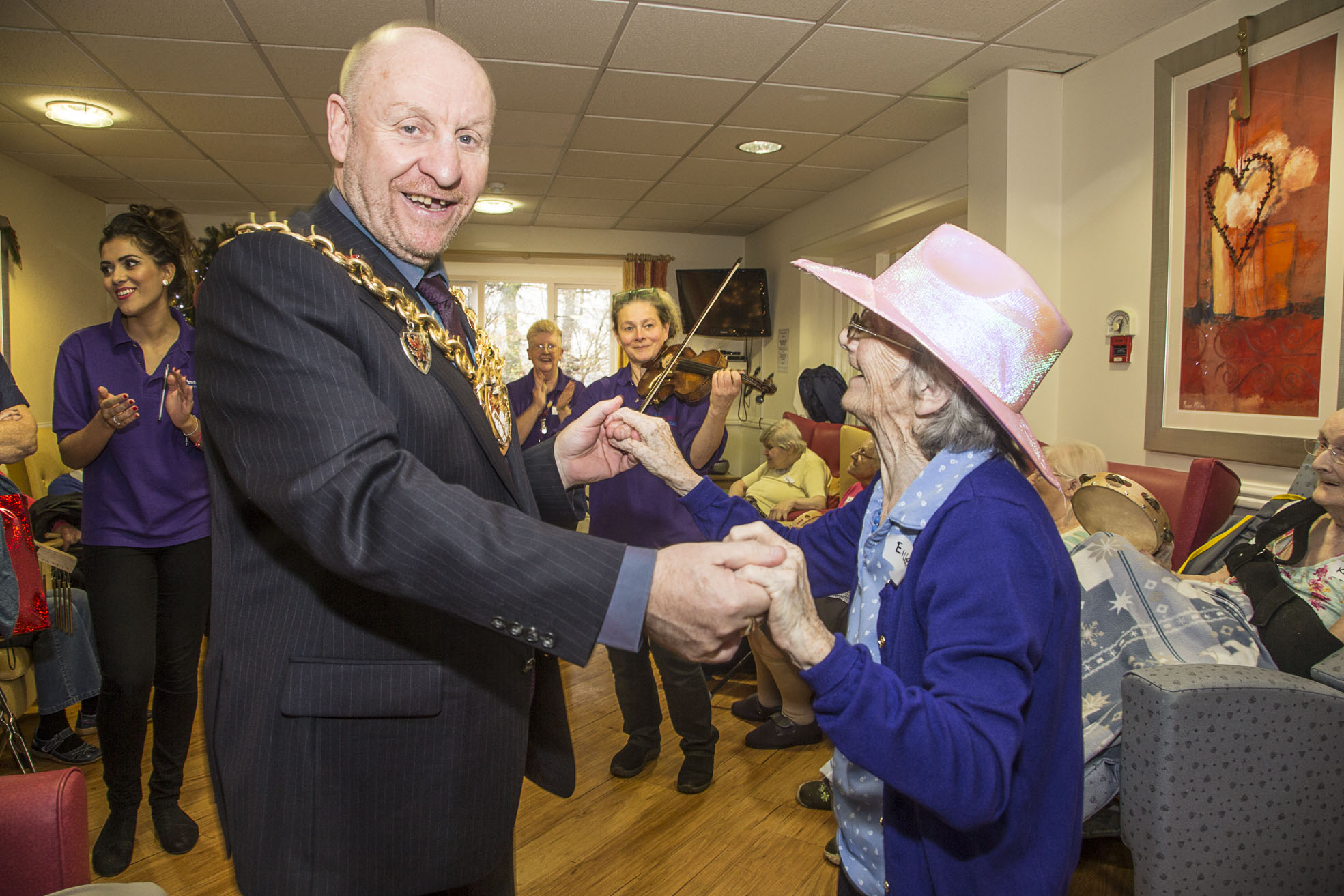 Care home residents and Mayor dance to festive tunes