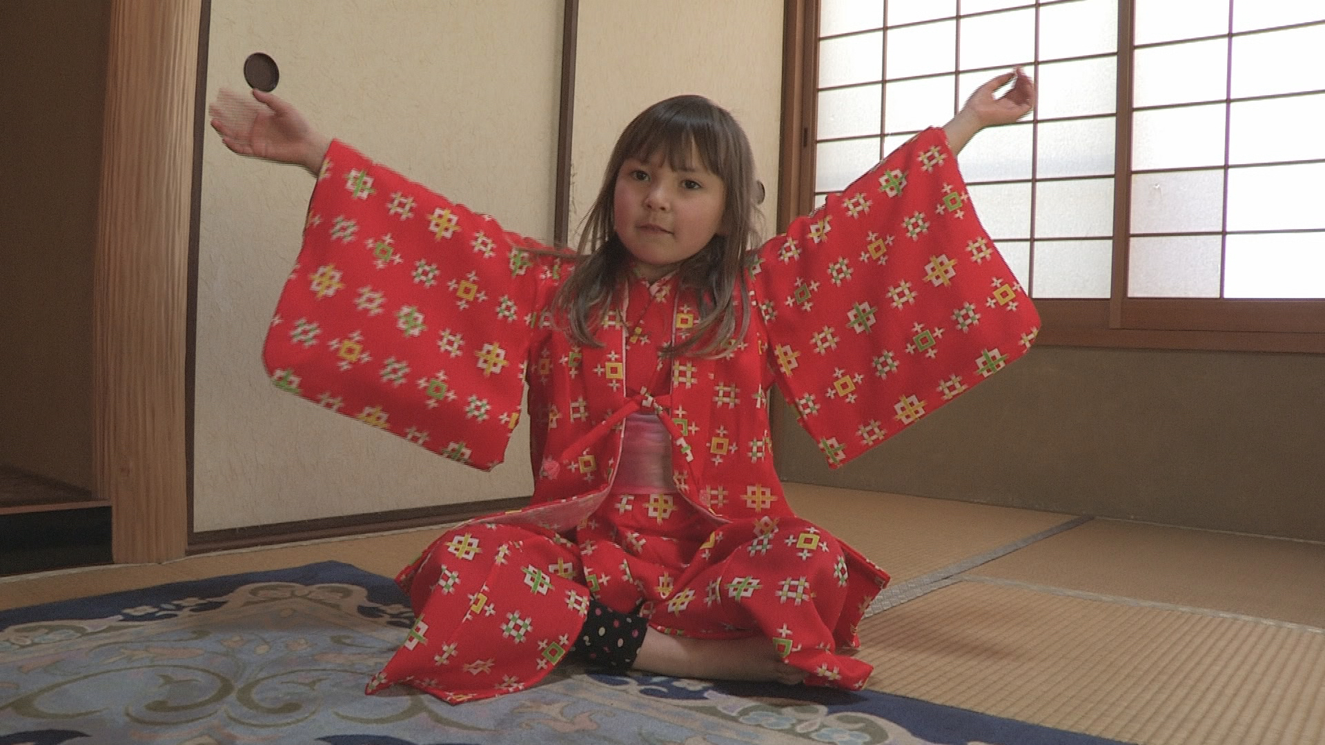 Starring role for Momoko as she learns how to put on a kimono