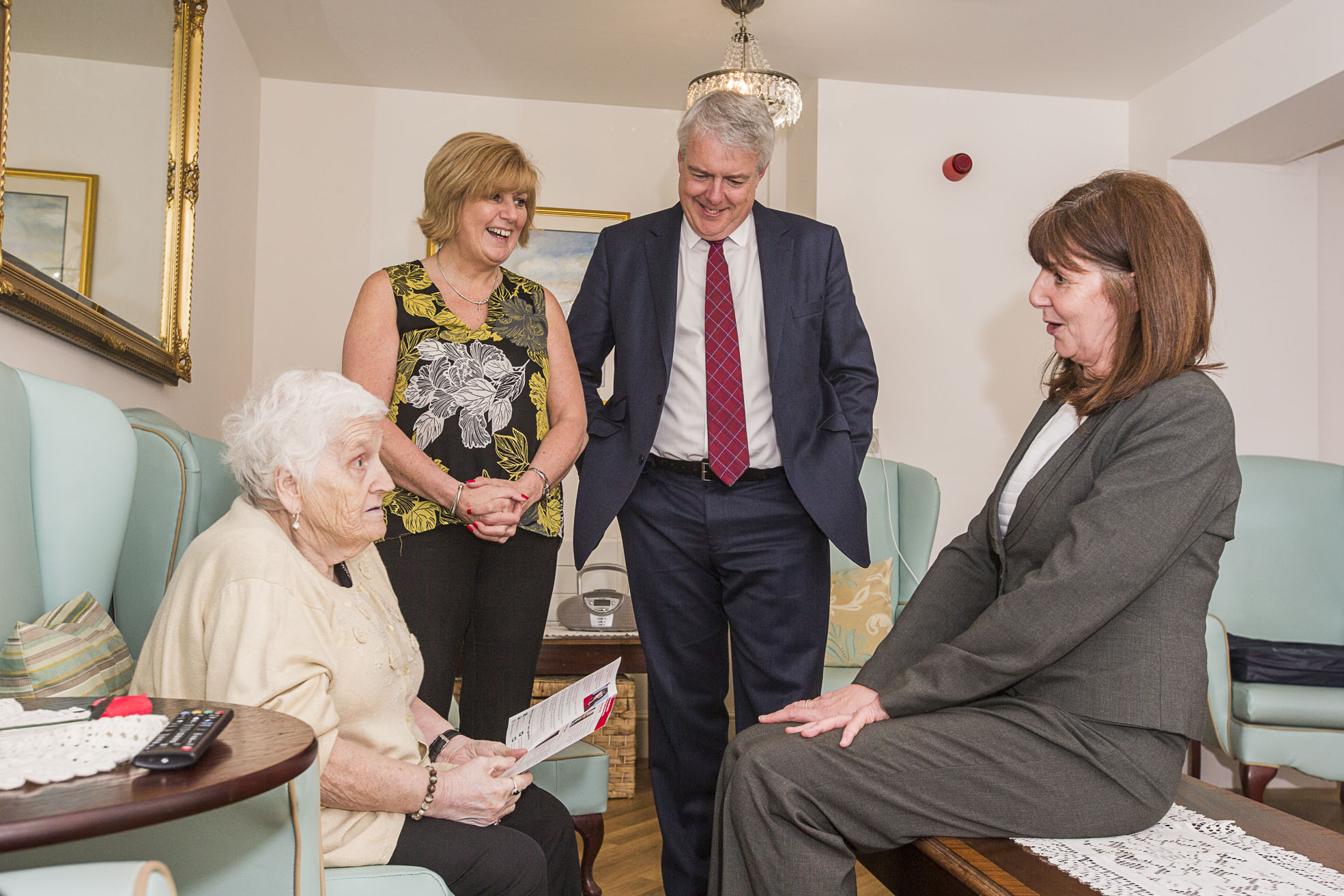 First Minister drops in for a cuppa and chat at Wrexham care home