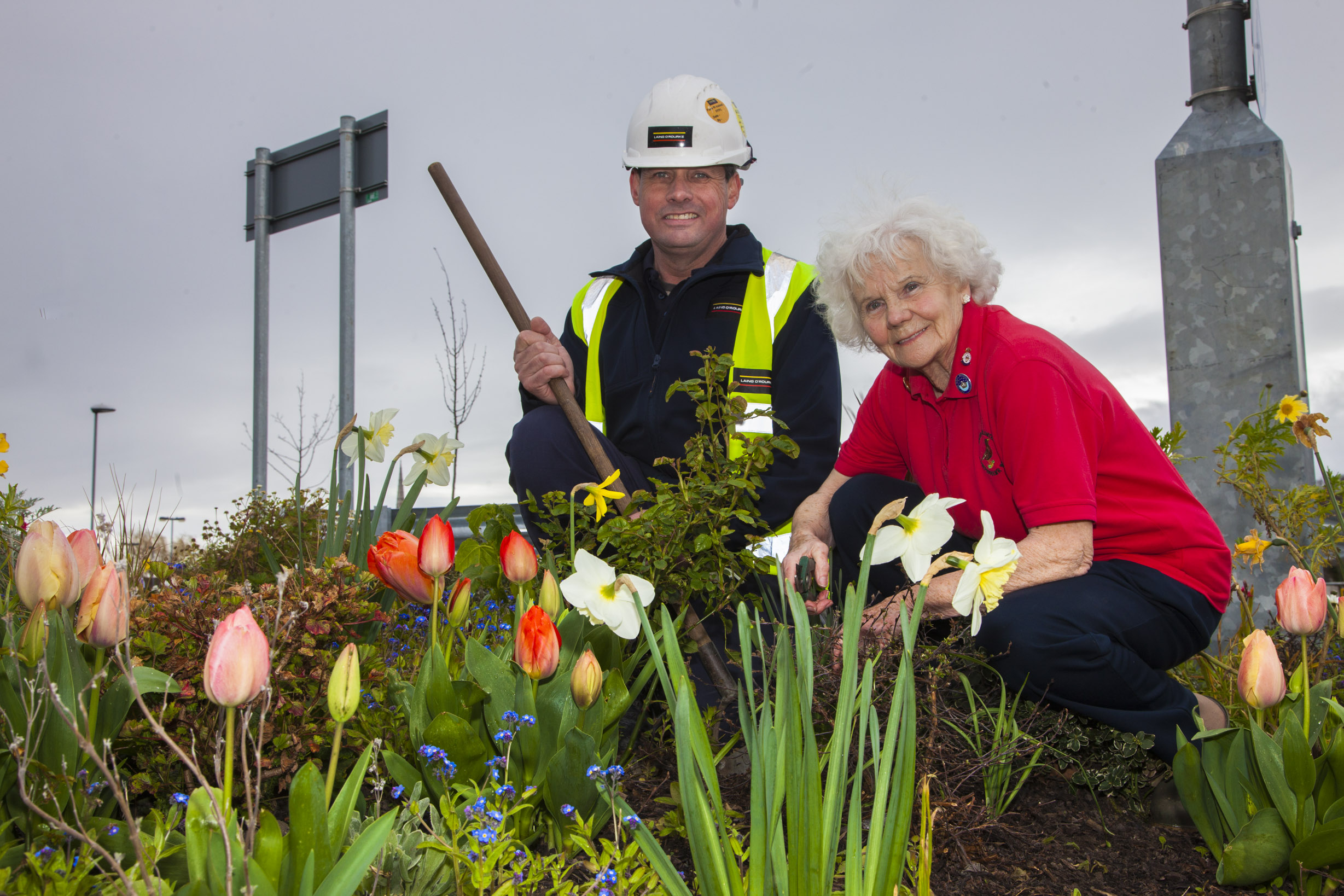 Construction workers help Phyllis turn hospital green for patients and visitors