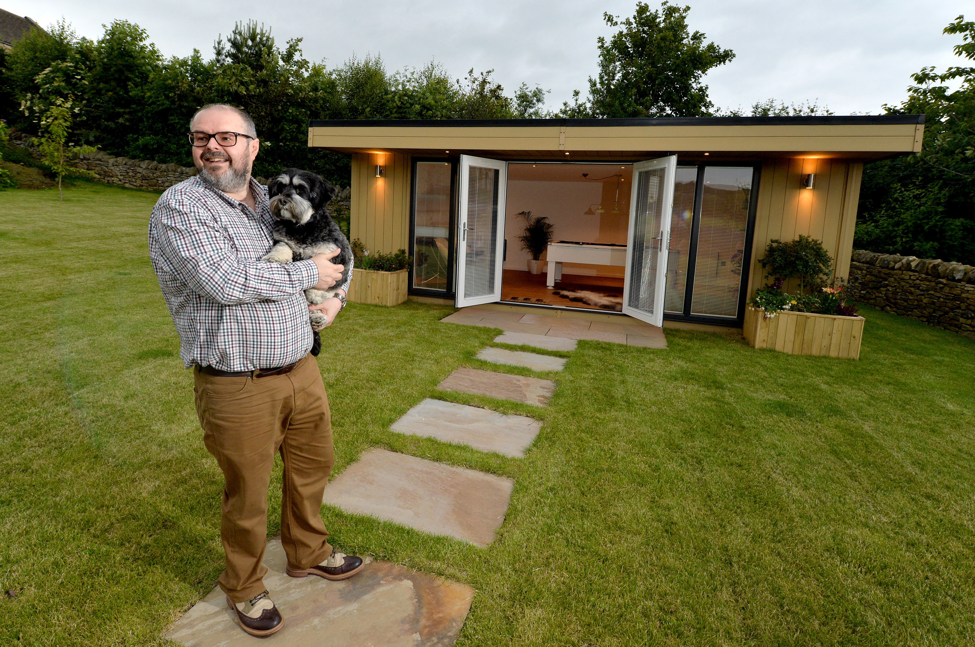 Businessman finds perfect work-life balance in his garden