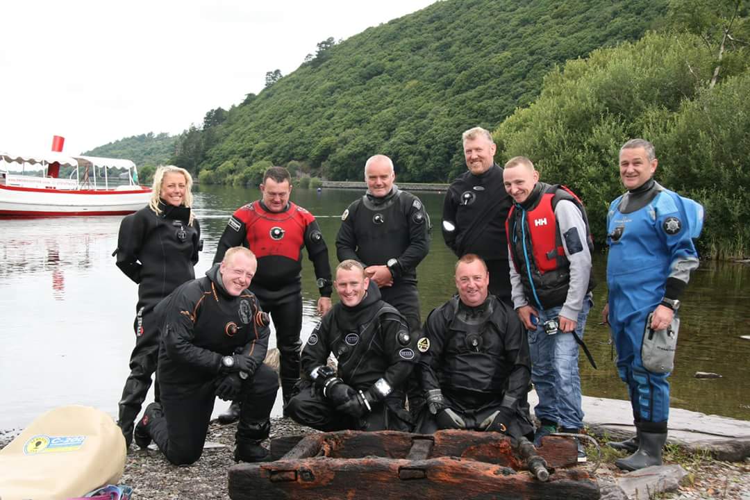Scuba divers from Anglesey use giant balloon to raise 110-year-old Welsh slate rail wagon from depths of Llyn Padarn