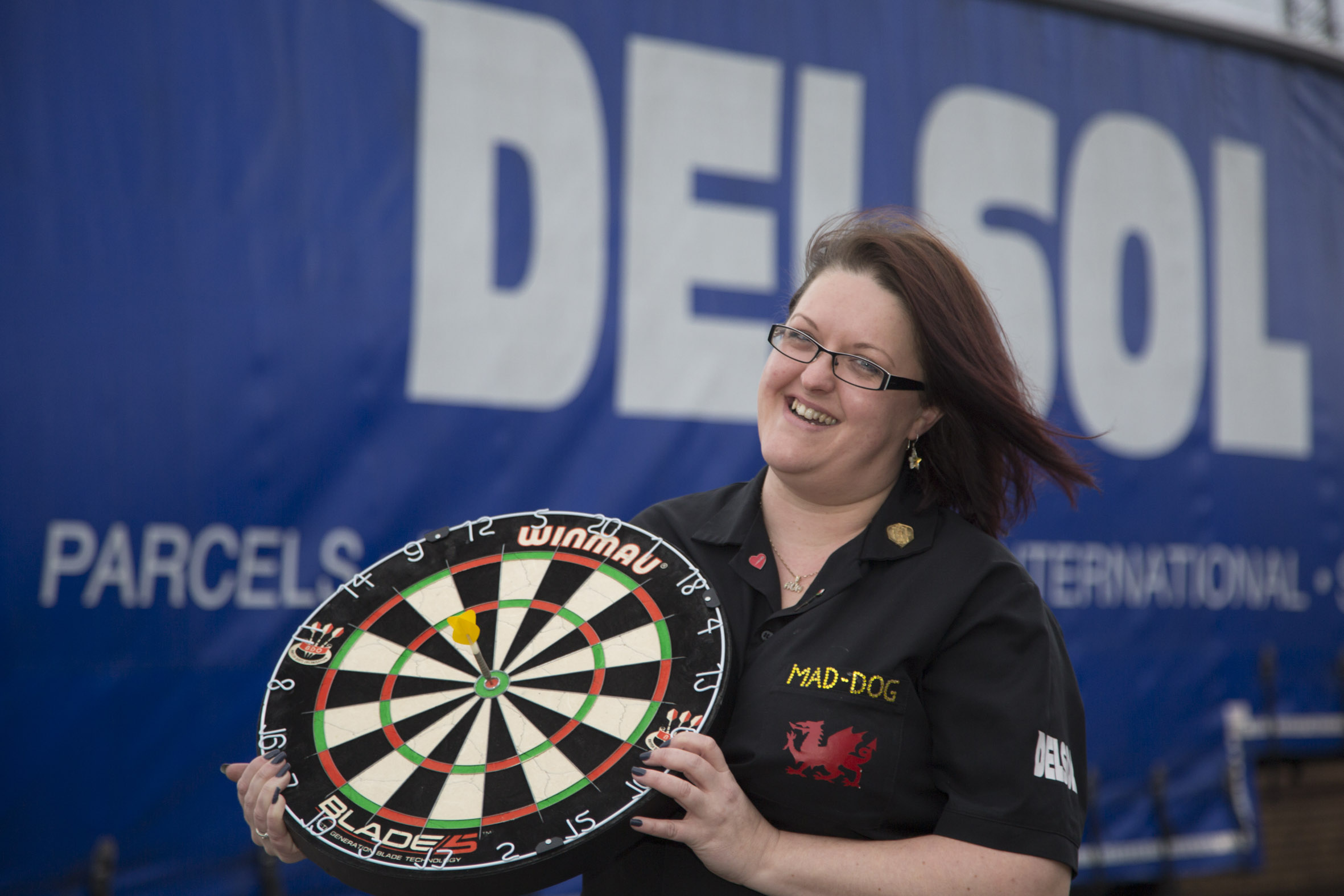 Darts champ on target thanks to sponsorship by delivery company Delsol
