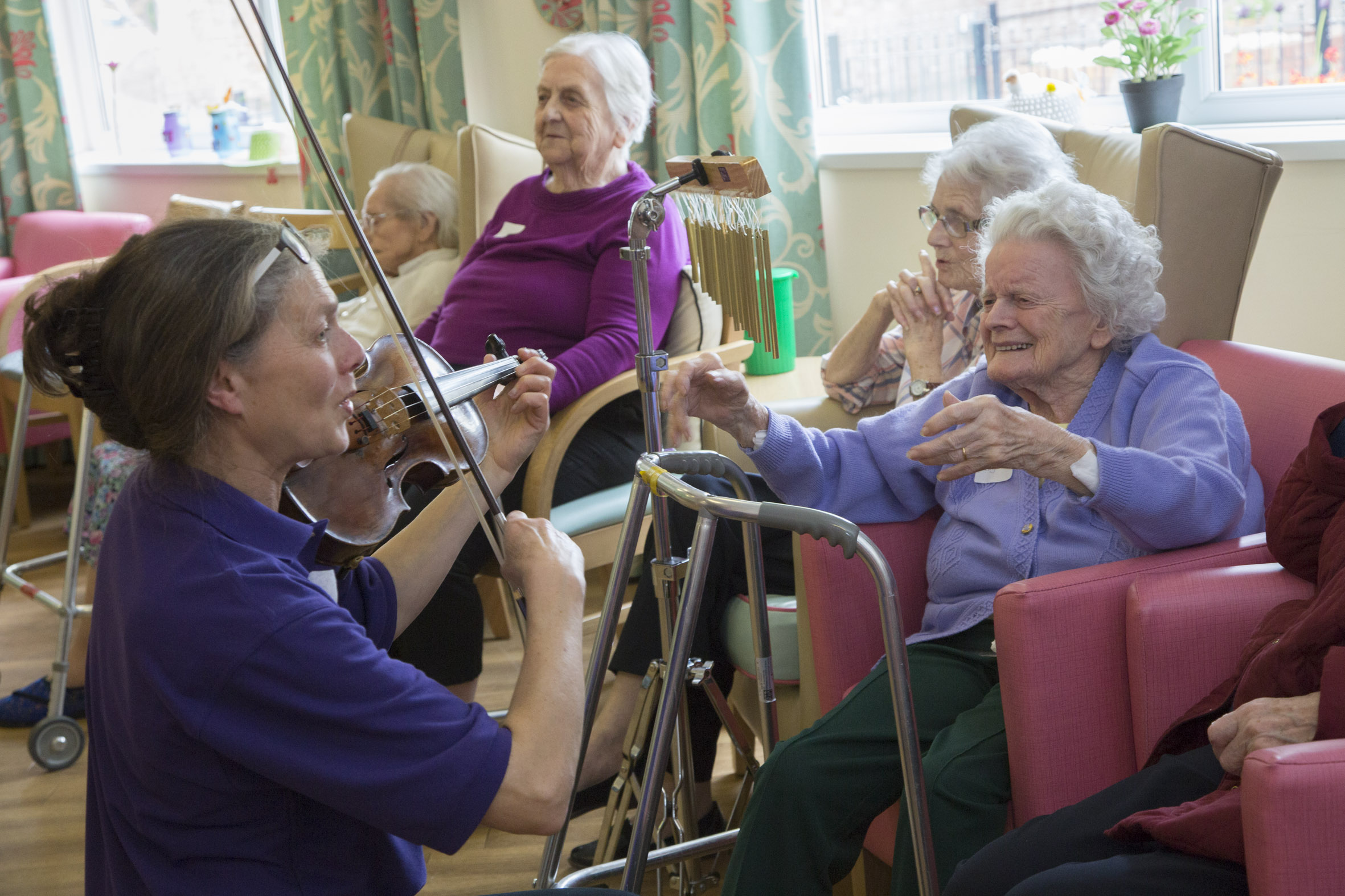 Pupils make music with world-class orchestra and care home residents
