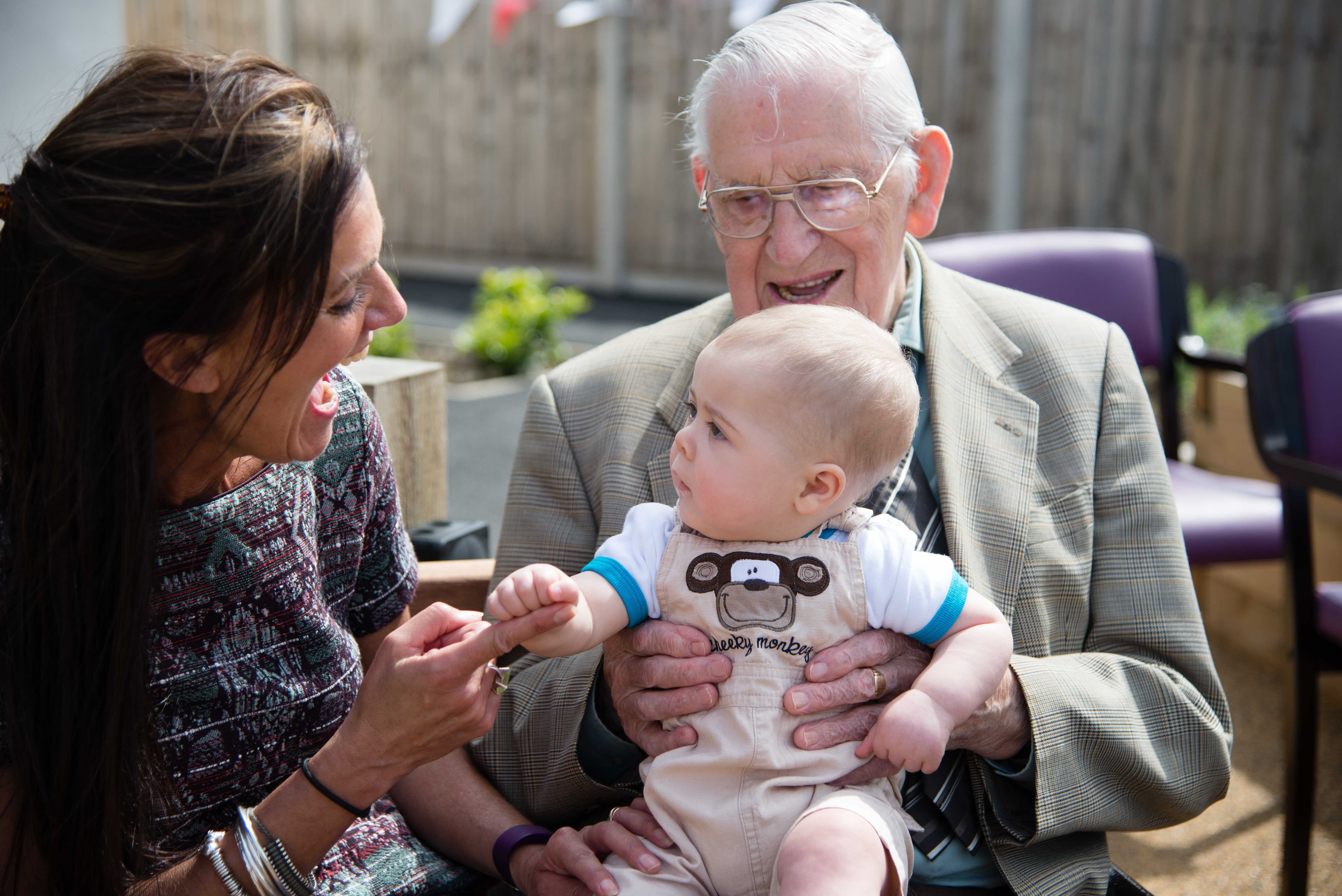 Three generations mark time in a “magical” new garden