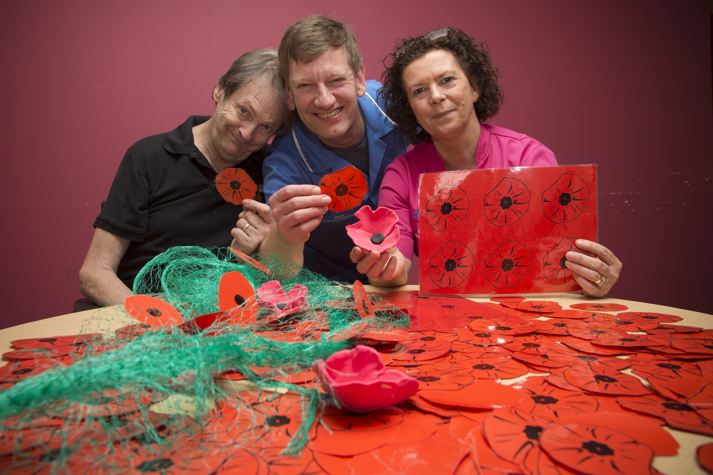 Care home residents create weeping wall of 1,500 poppies