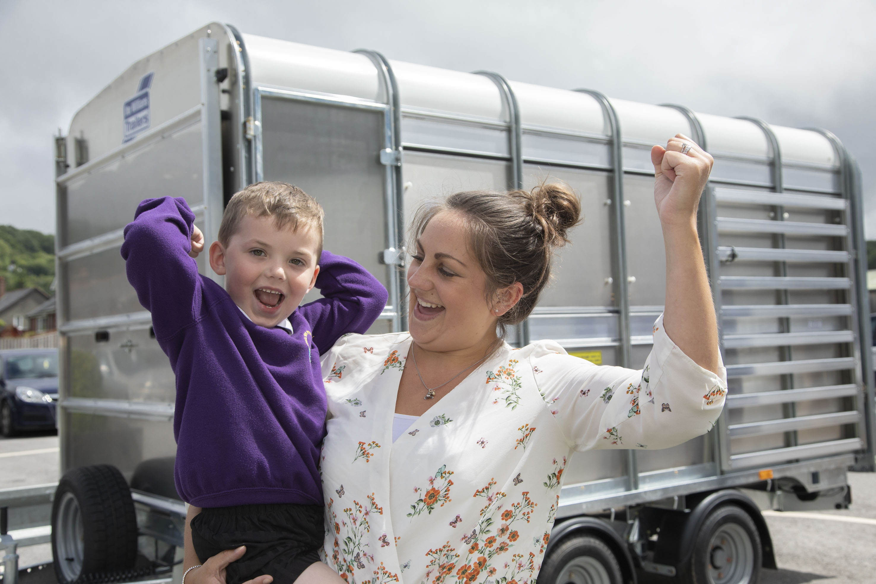 Youngsters pop in to say thanks to trailer firm