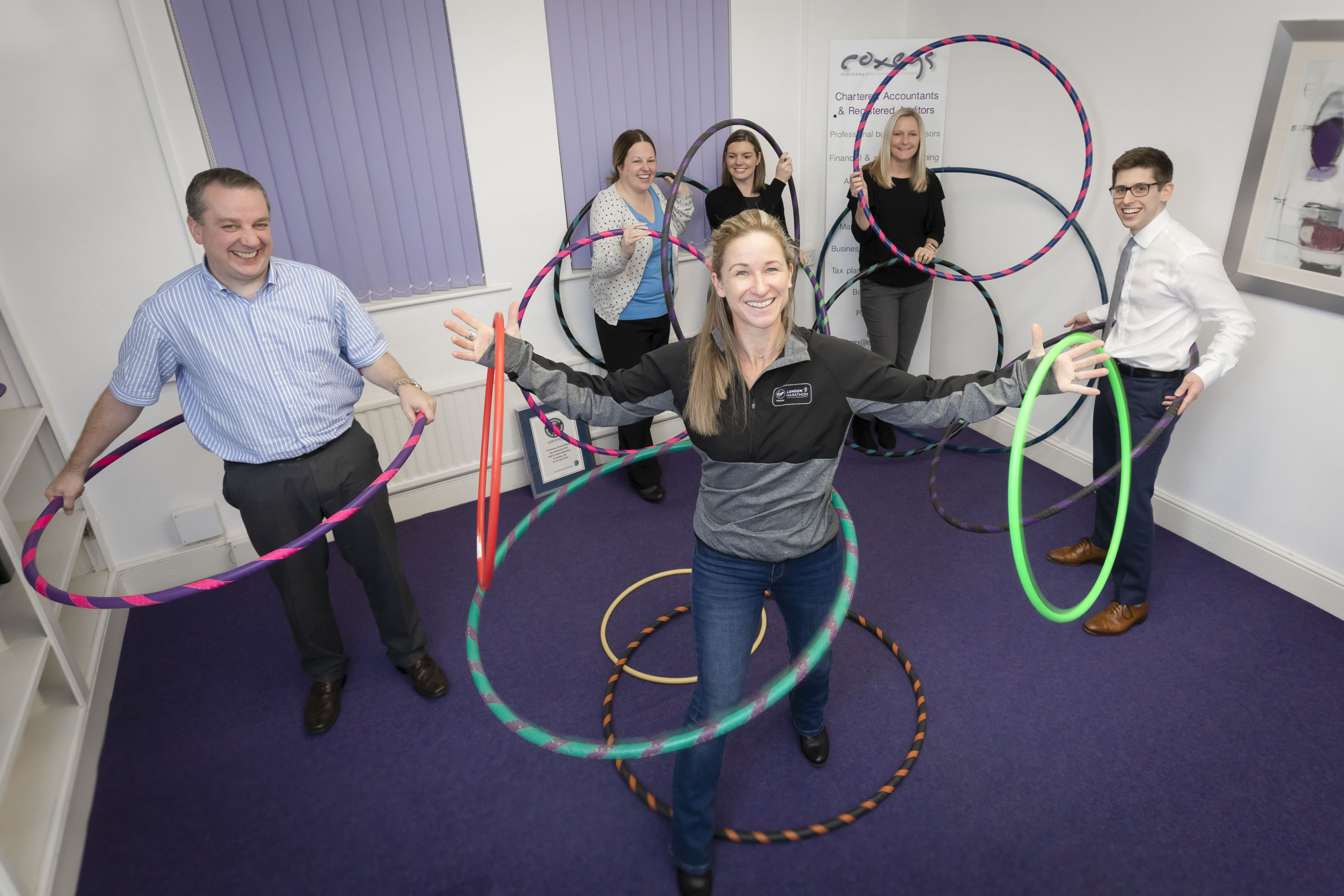 World record-breaking hula hooper building business empire by tackling workplace stress 