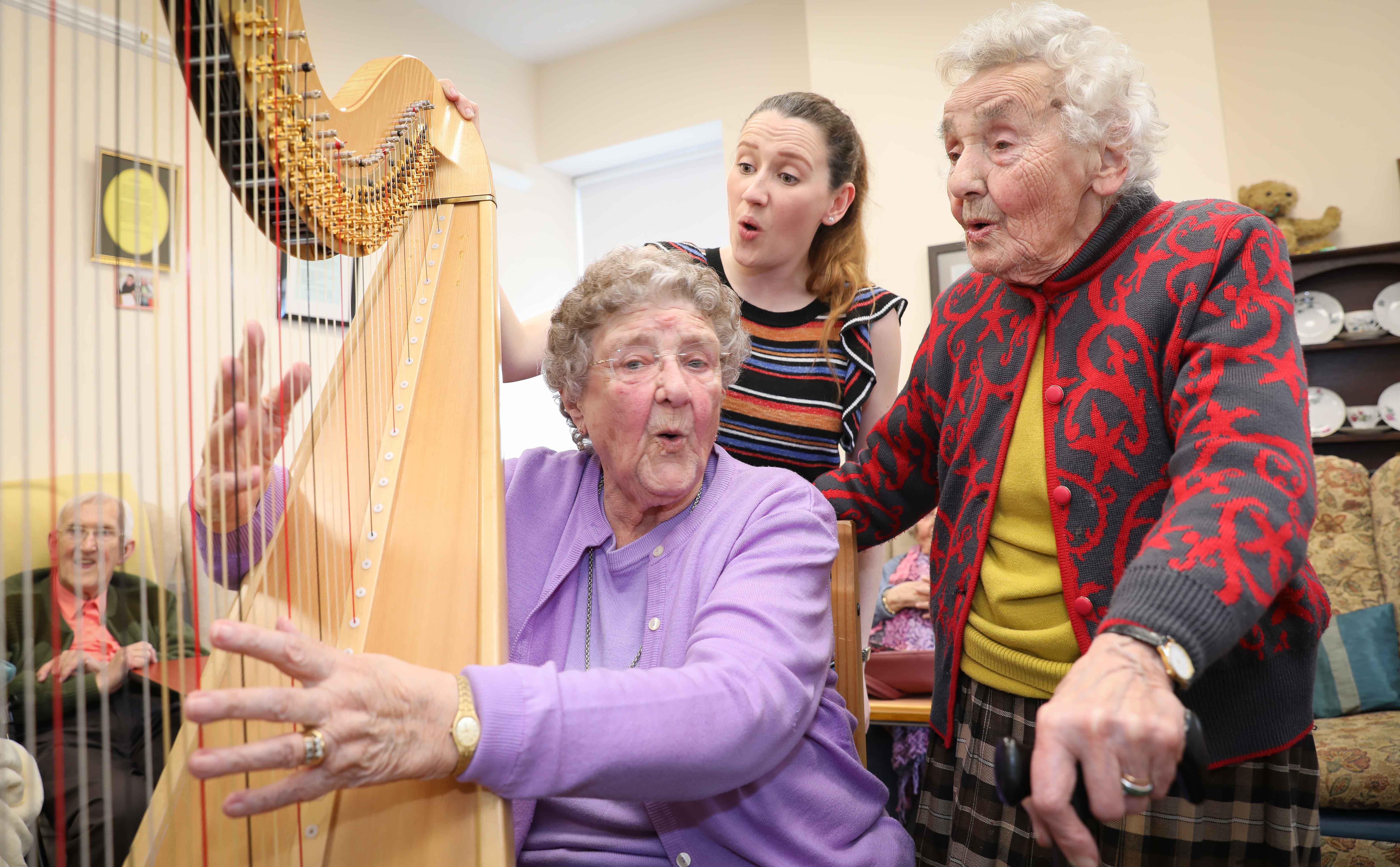 Dynamic duo aged 92 on song with renowned harpist Elfair