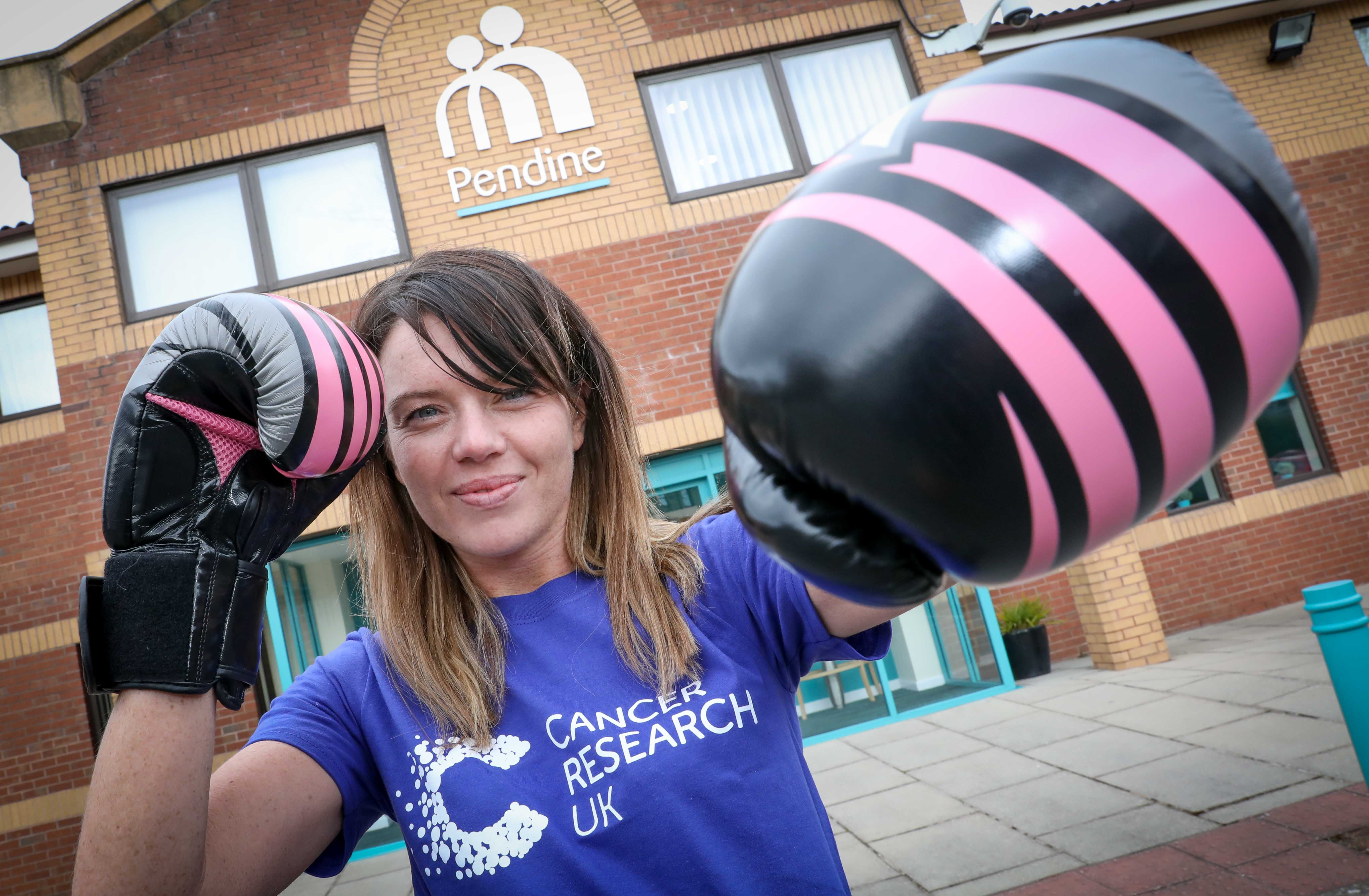 Sian boxes clever to raise money for cancer charity and honour memory of stab victim Craig