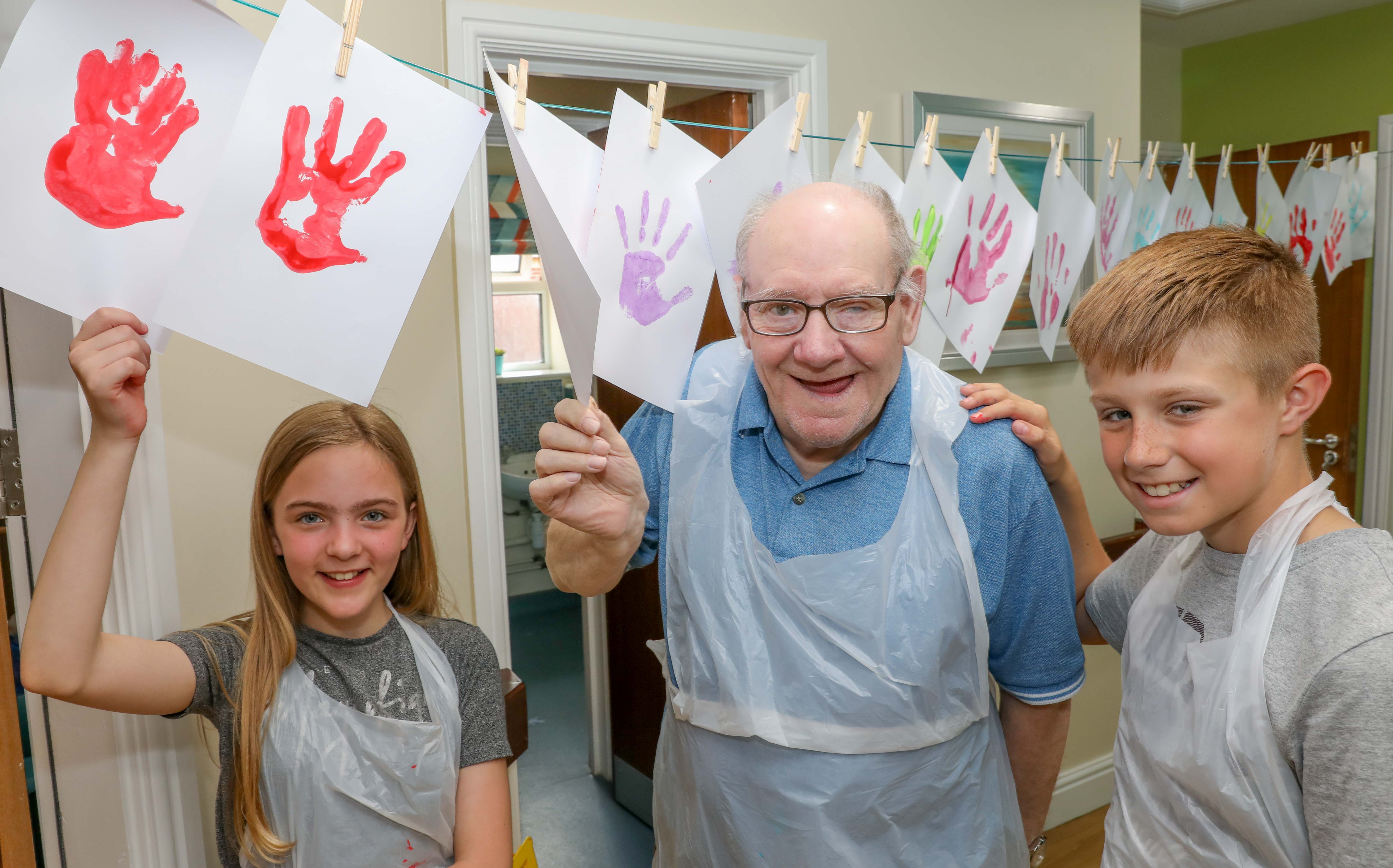 Artistic youngsters join forces with care home residents to brighten up safety centre