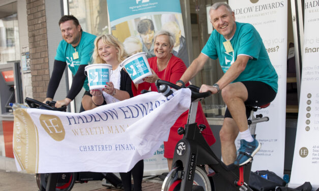 Two Wrexham finance bosses take two wheels to raise money for hospice