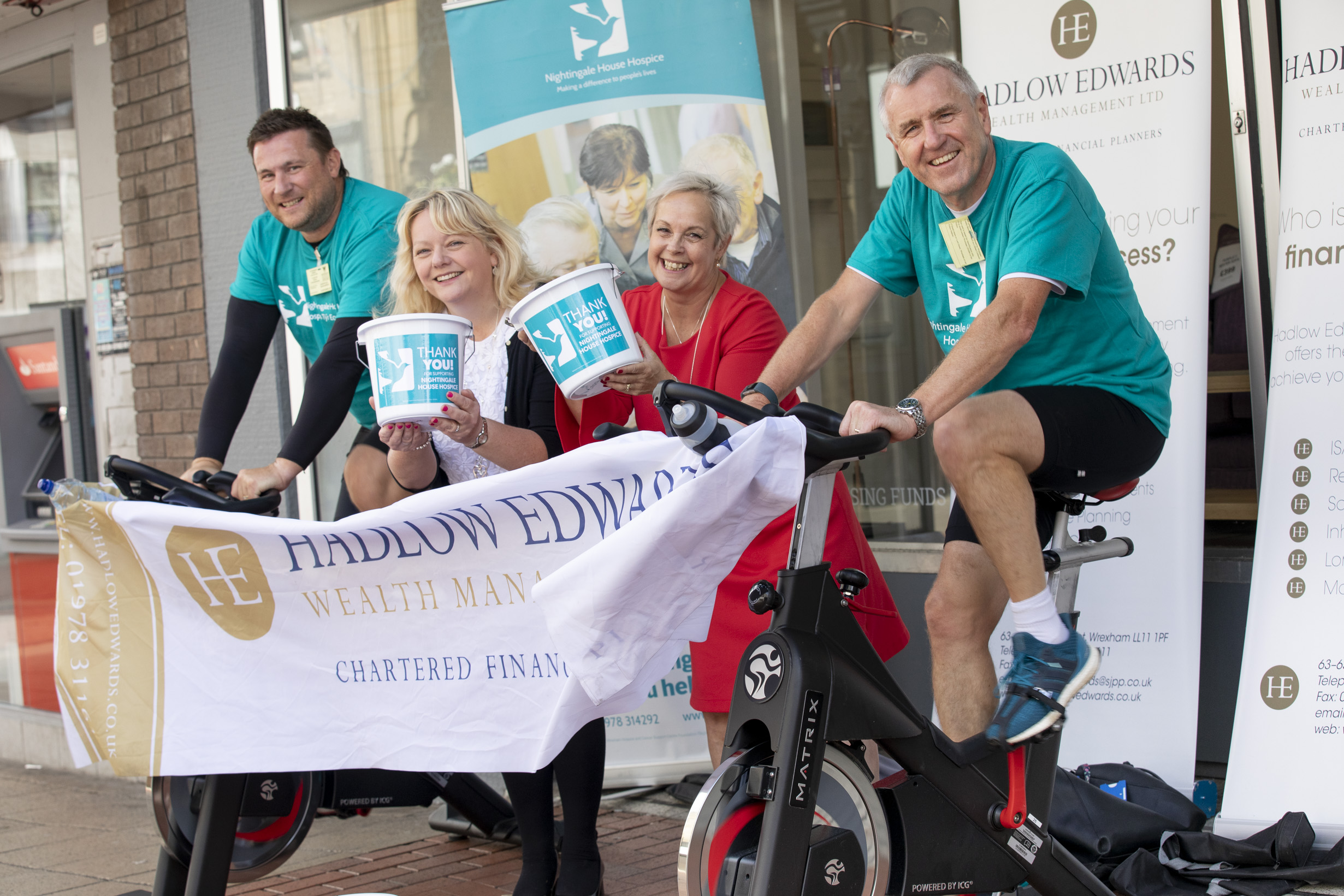 Two Wrexham finance bosses take two wheels to raise money for hospice
