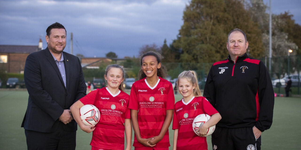 U12 girls football team net new kit thanks to Wrexham finance firm