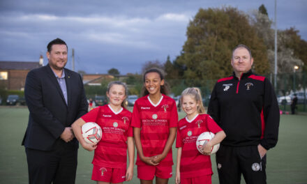 U12 girls football team net new kit thanks to Wrexham finance firm