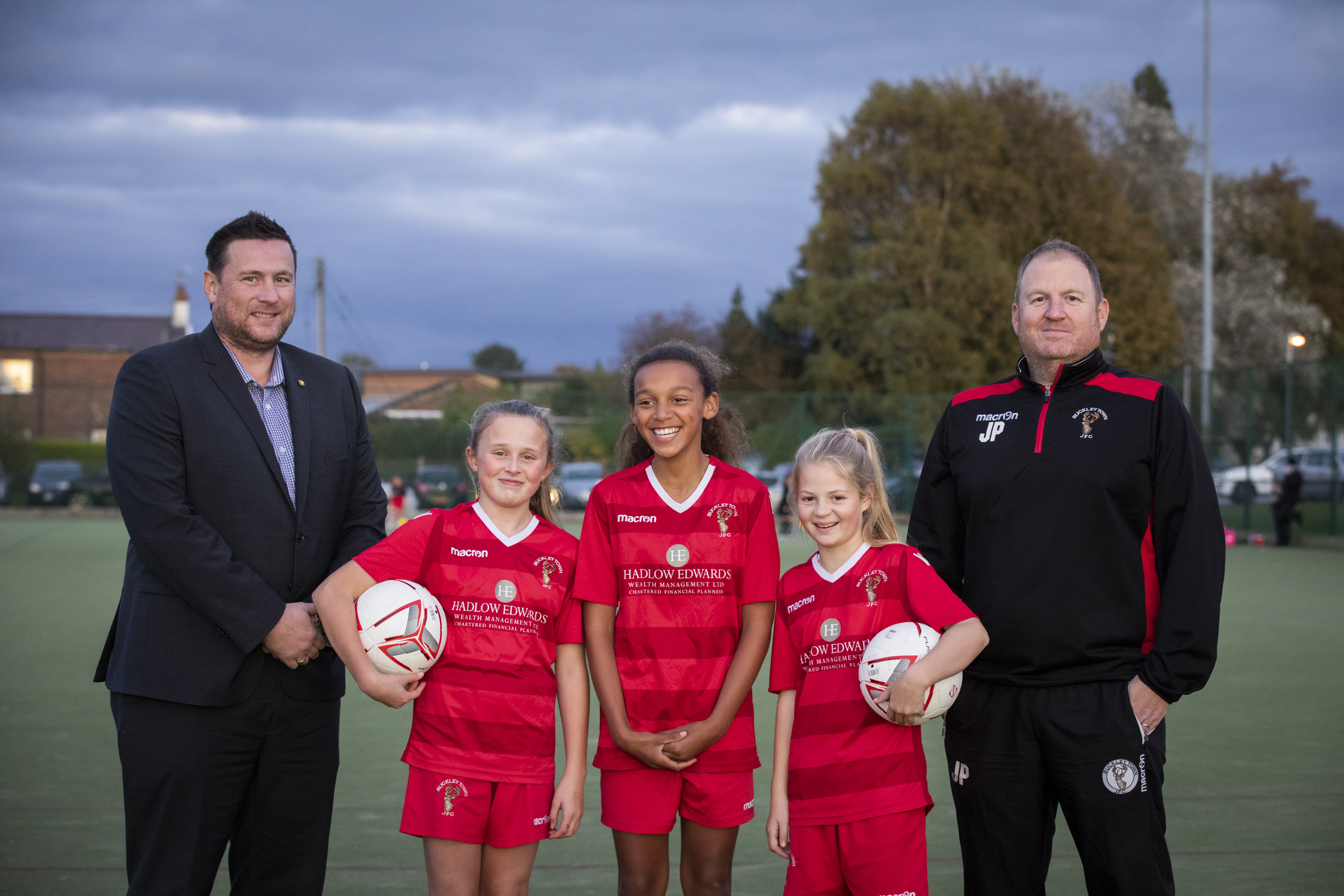 U12 girls football team net new kit thanks to Wrexham finance firm