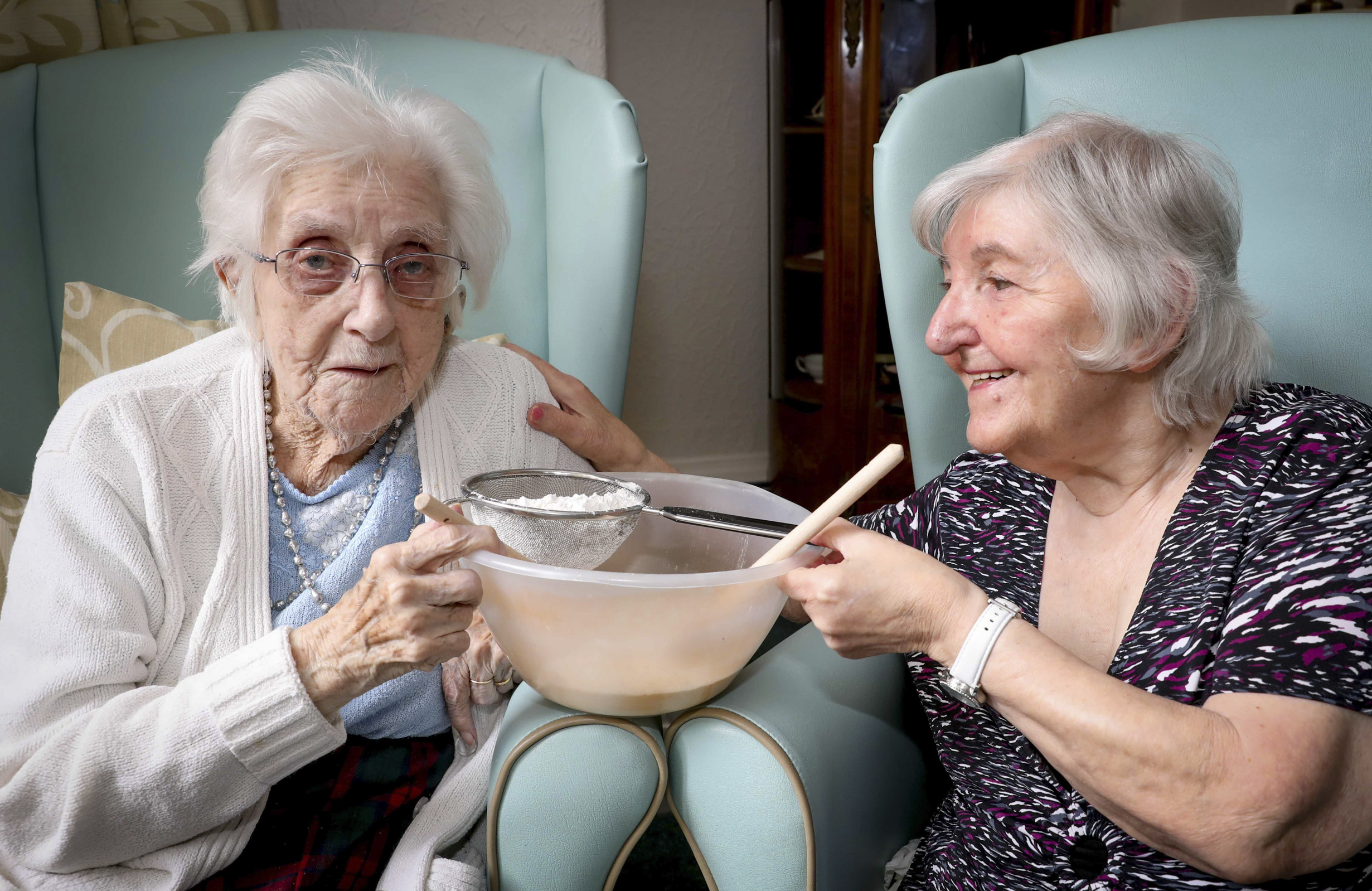 “Formidable” ex-teacher Rhiannon, 104, reunited with pupil in care home