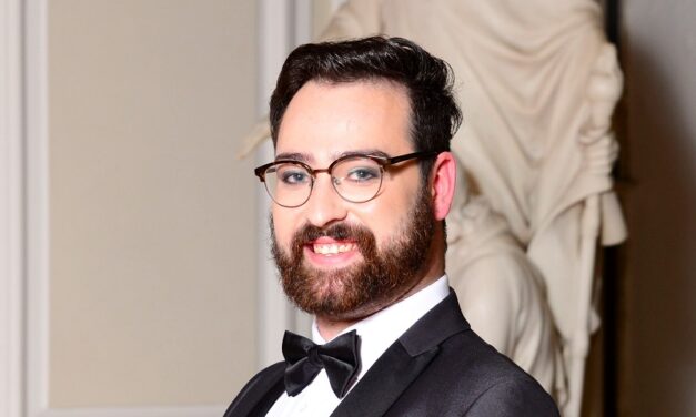 Stage star Corey celebrates new rise to fame with social care award