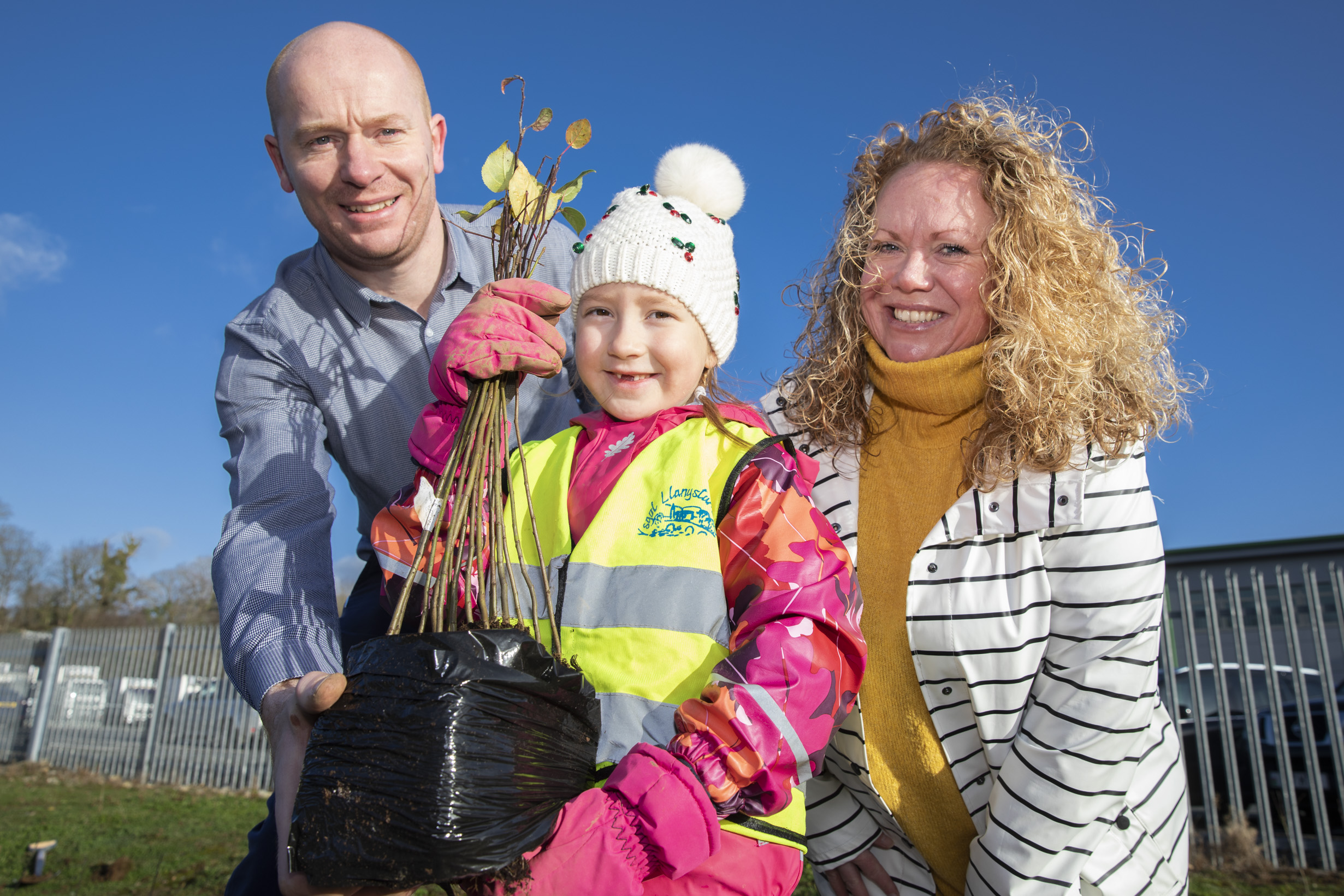 Green-fingered schoolchildren help food distribution firm plant more than 500 trees