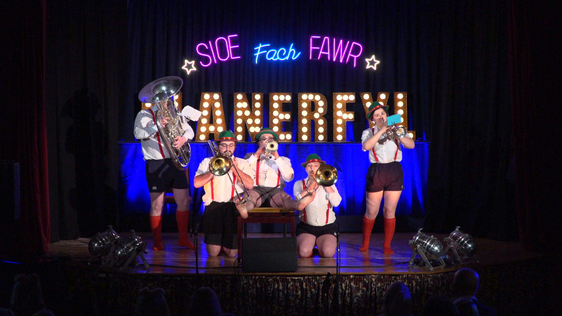 Talented teacher Osian plays cornet and two trombones with his feet – all at the same time