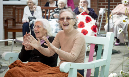 Care home residents sing and dance as they savour musical fun in the sun