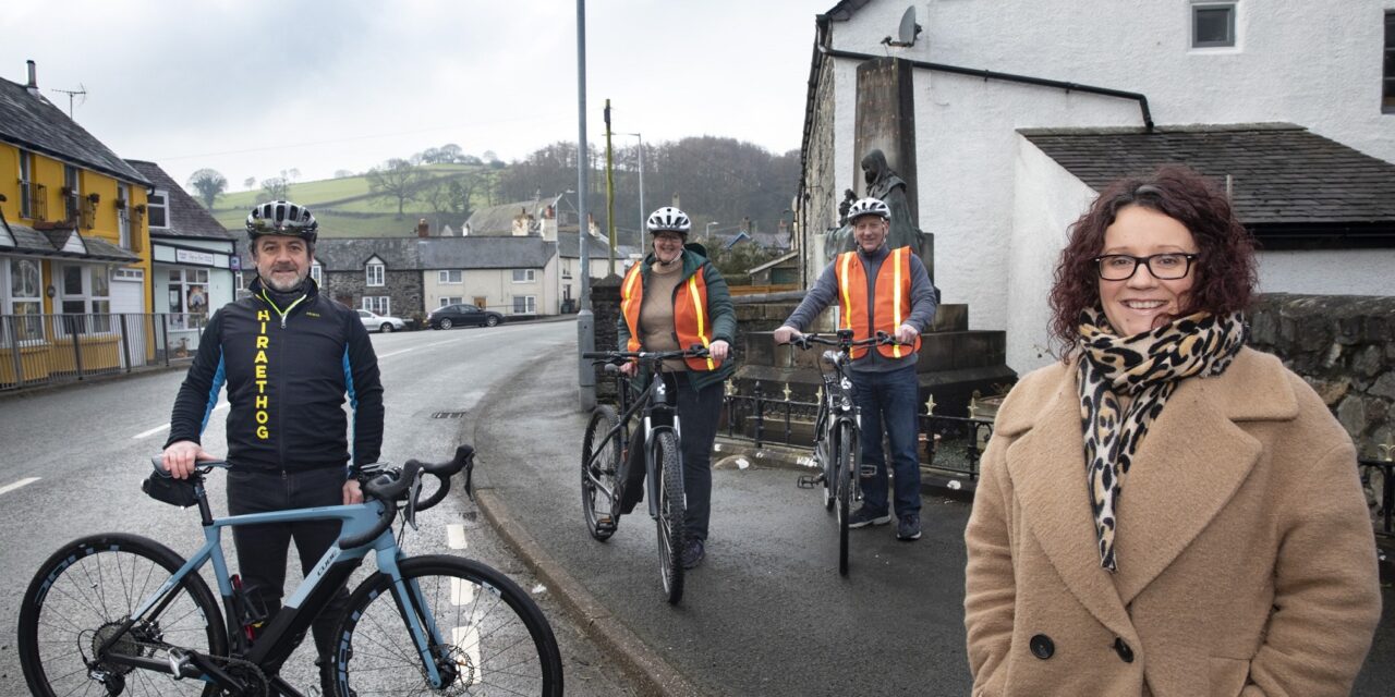 Llansannan electric bikers urging others to cash in on wind farm cash