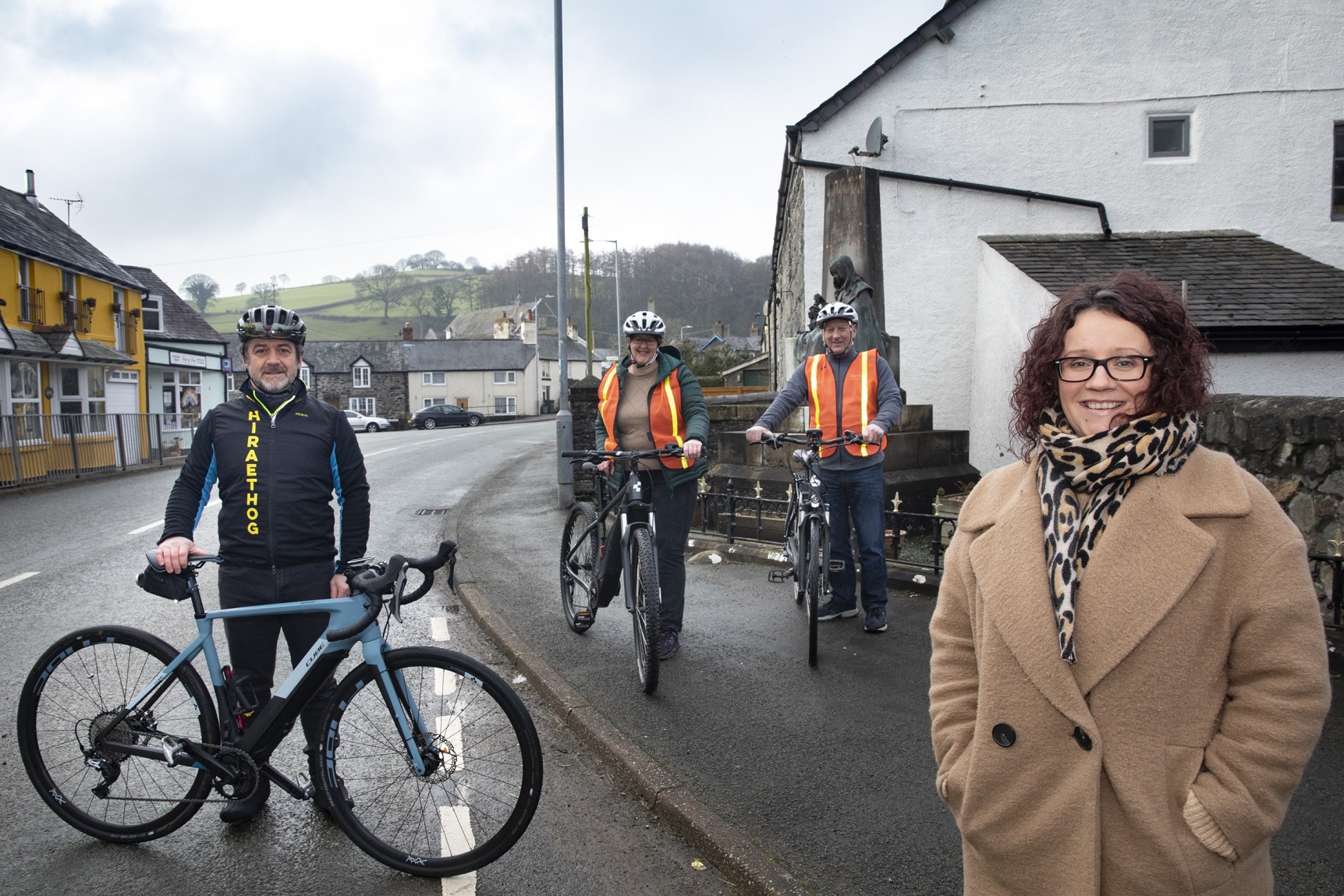 Llansannan electric bikers urging others to cash in on wind farm cash
