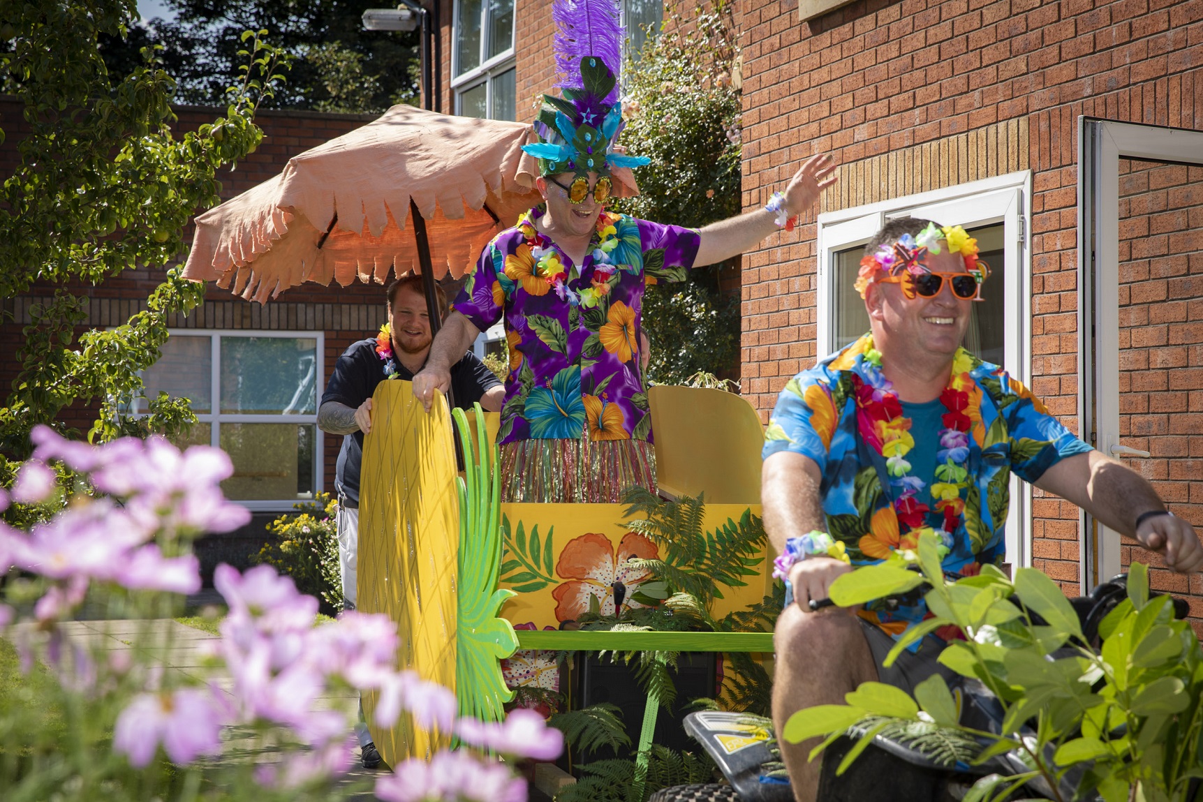 Wacky pineapple-mobile gave tropical flavour to fun-filled care home carnival