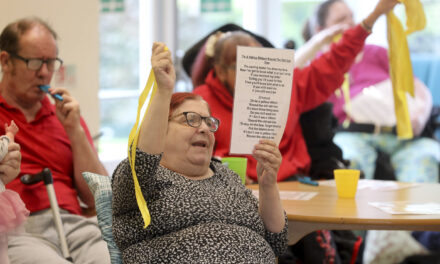 Care home residents in full voice as they sing to keep fit