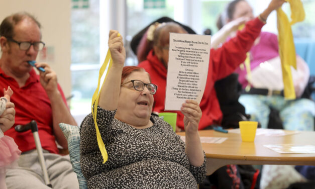 Care home residents in full voice as they sing to keep fit