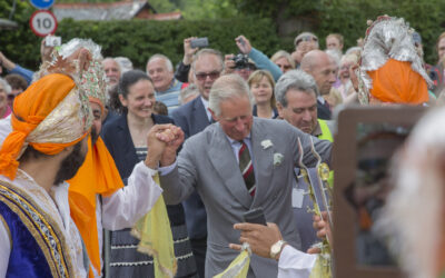 Prince of Wales hails peace festival as “shining example of peace and harmony”