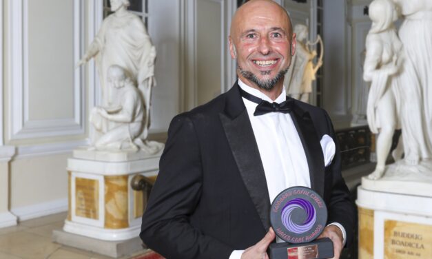Ex-motivational coach who now inspires care home residents to keep active celebrates major award
