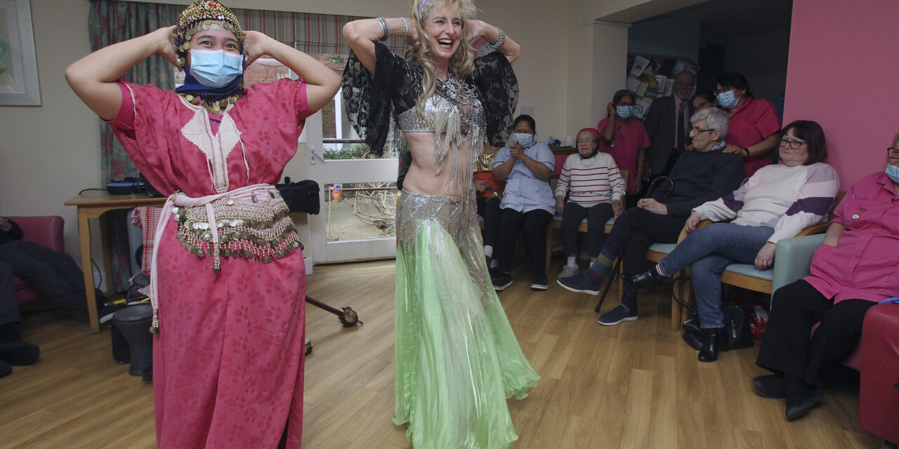 Spicy rhythms of the East come to care home as belly dancer comes gliding in