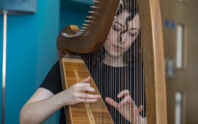 Talented harpist Gráinne delights care home residents after performing for King Charles