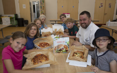 Rhos youngsters get expert guidance on pizza-making from chef Steve