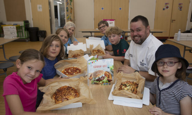 Rhos youngsters get expert guidance on pizza-making from chef Steve