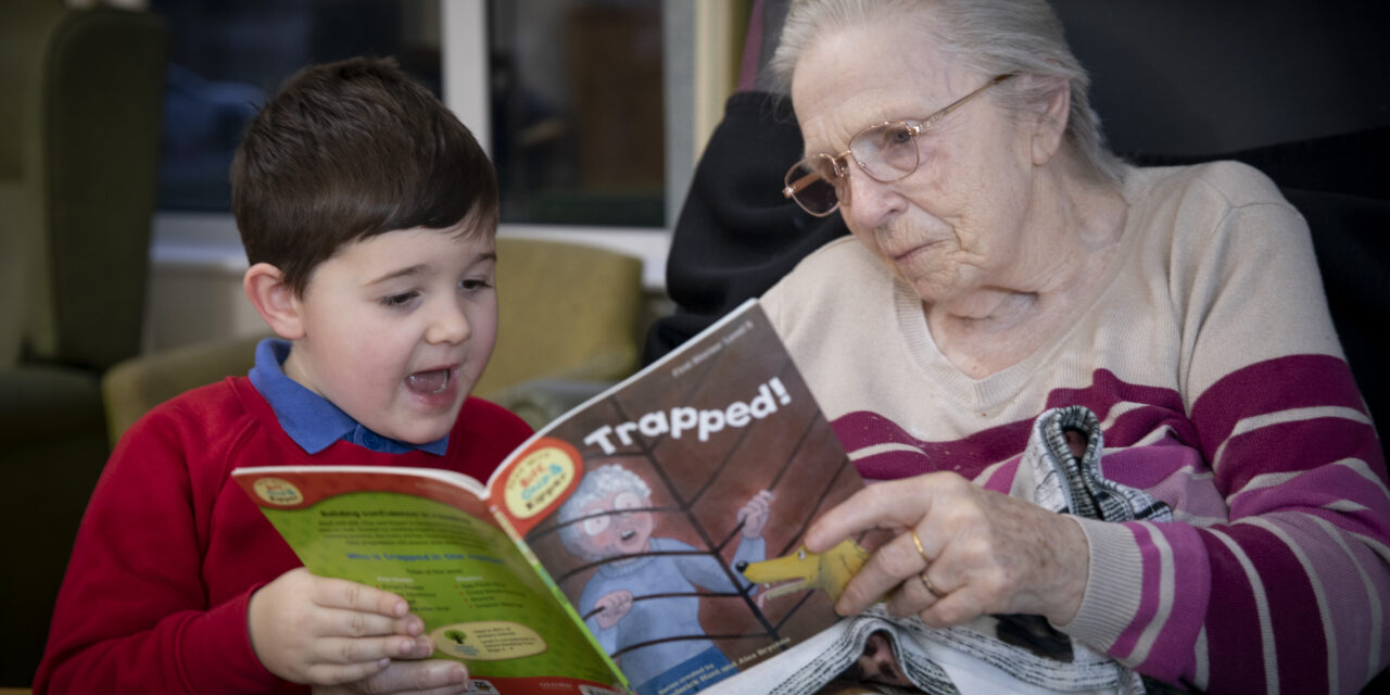 Book-loving schoolboy Harri, five, is ray of sunshine at care home where he reads adventure stories to the residents