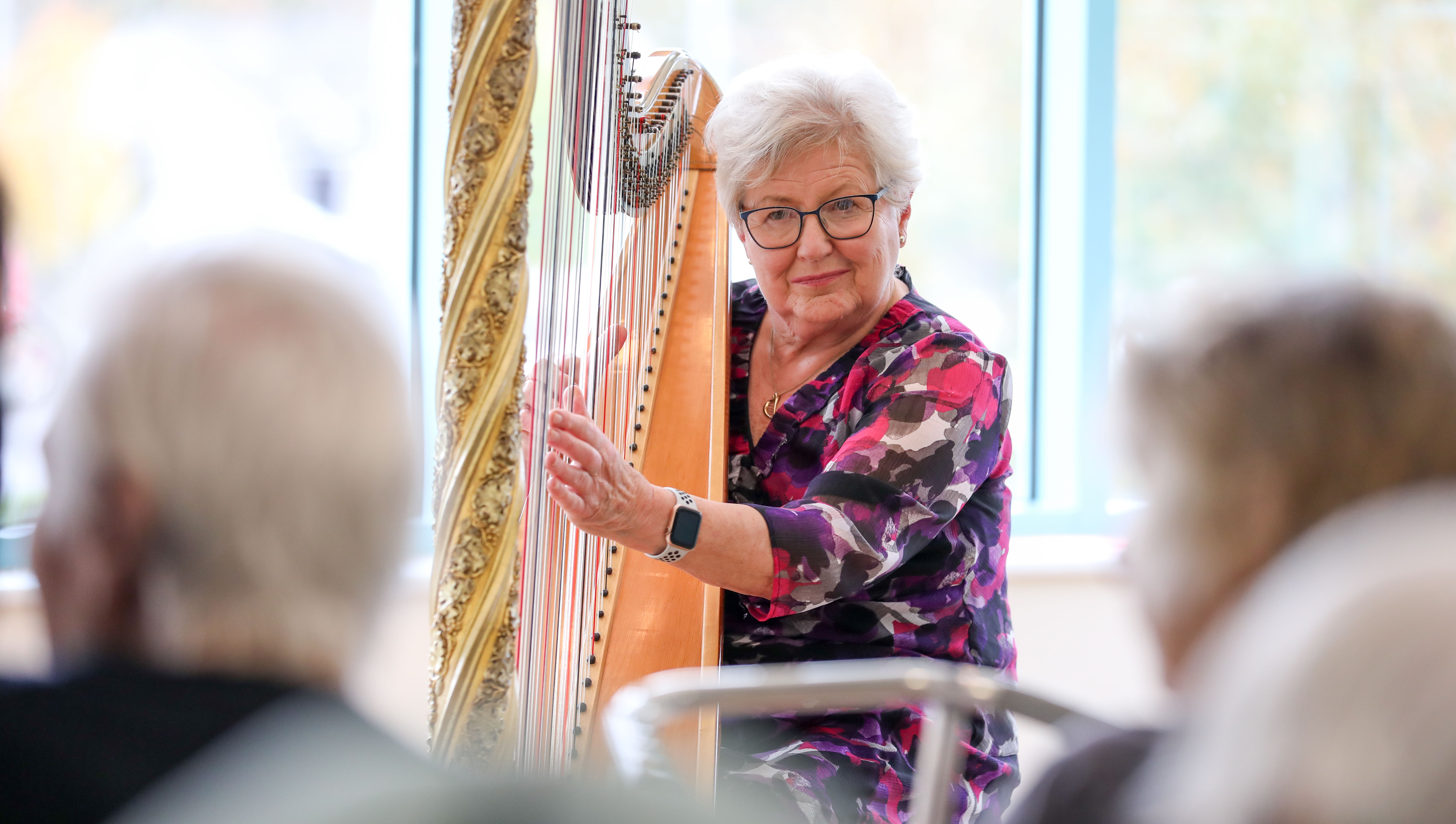 Emotional care home reunion for top harpist Elinor Bennett