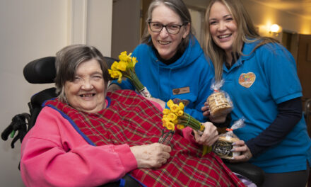 Surprise delivery of Welsh Cakes and daffodils brings smiles to faces of residents at Gwynedd care home