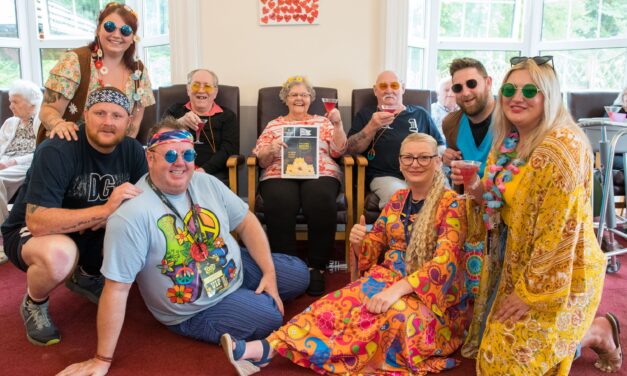 Men and women of Harlech bring flower power to residents of Pwll care home