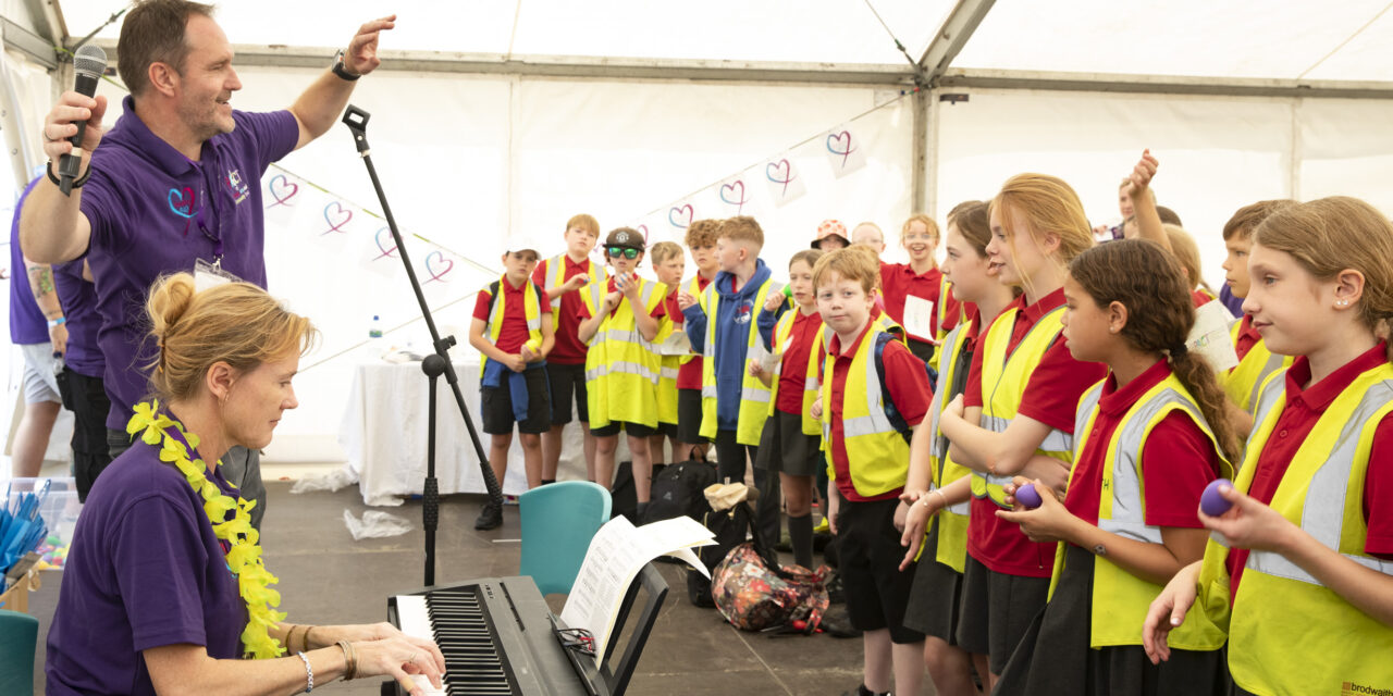 Music and maracas bridge the generations with sing-song at Llangollen Eisteddfod