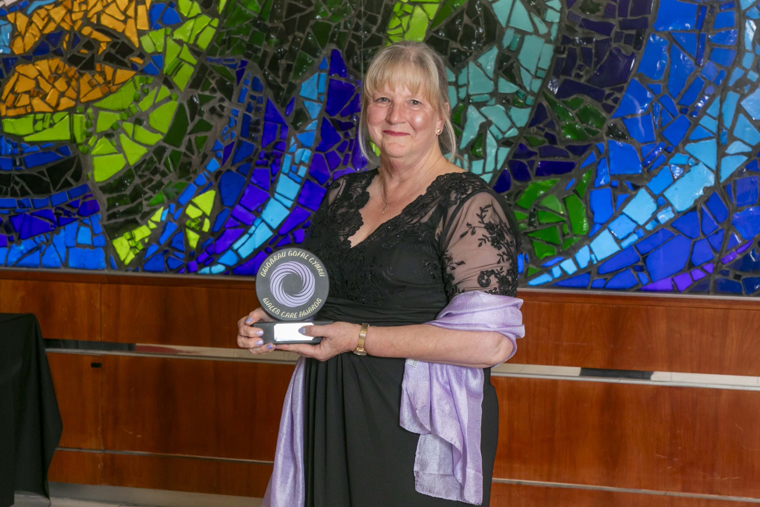 Retired nurse Carol honoured with “golden handshake” after lifetime of caring for others