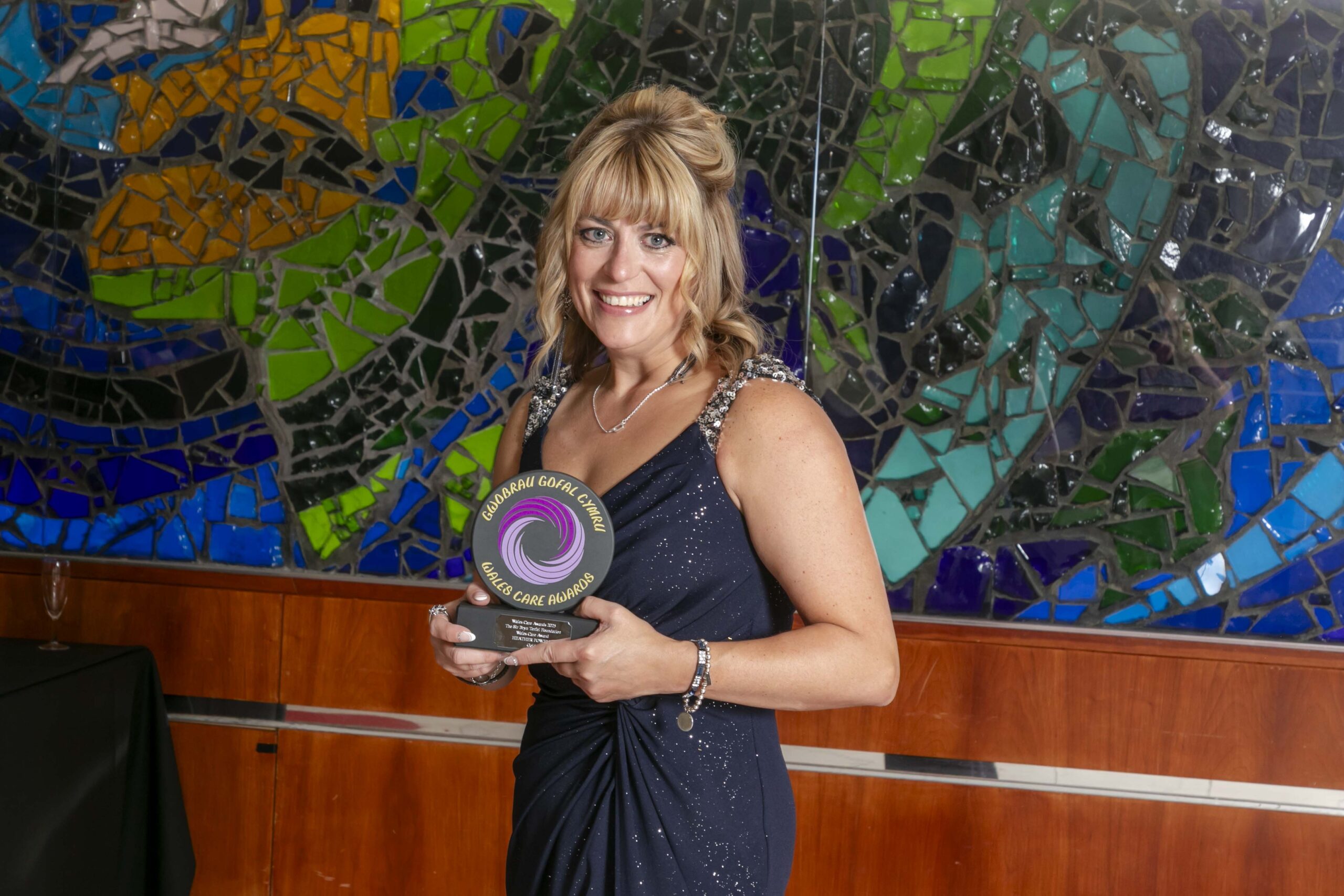 Music hero Heather strikes gold at ‘social care Oscars’ for giving thousands of North Wales kids the gift of music