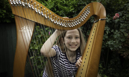 Young harpist stars as new music cooperative celebrates landmark first year in Conwy